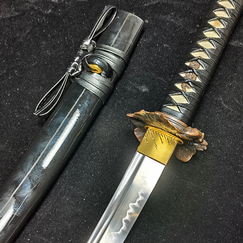 (T10 mulches soil, burning blades to create a ripple pattern)katana