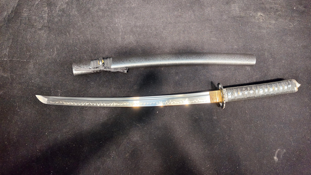 (T10 covers the soil and burns the blade to form ripples)katana
