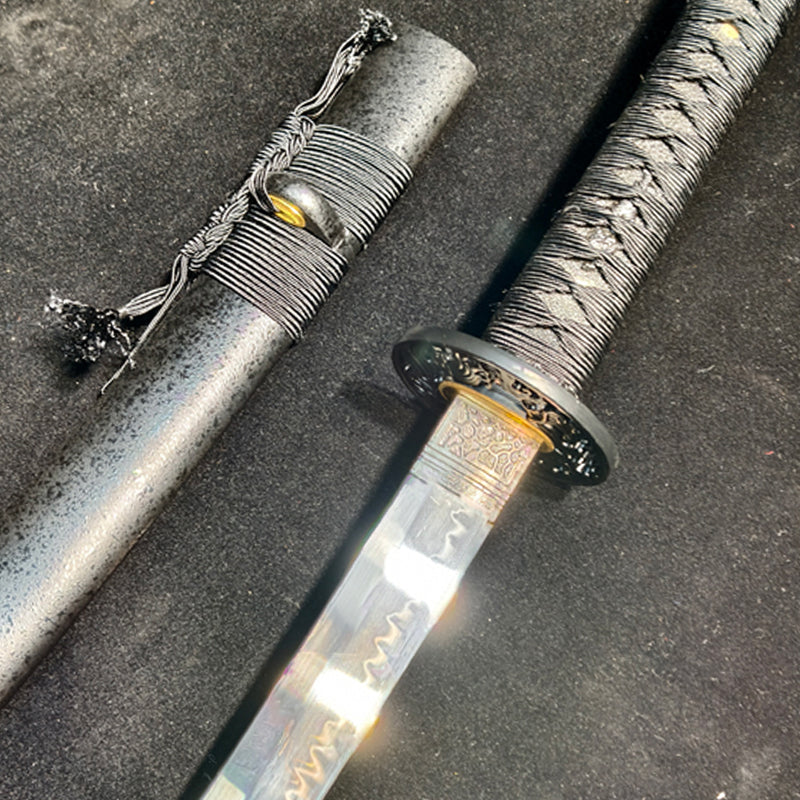 TI0 (covered with soil and burned to create the blade's ripple pattern)katana