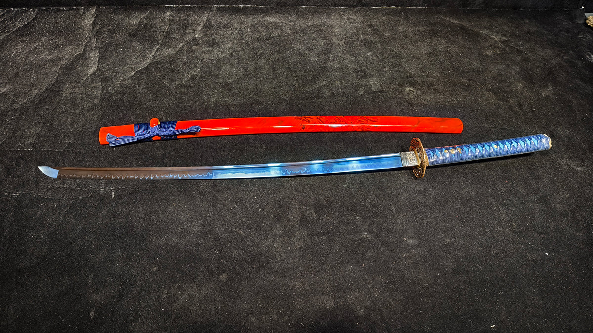 TI0 (covered with soil and burned to create the blade's ripple pattern)katana