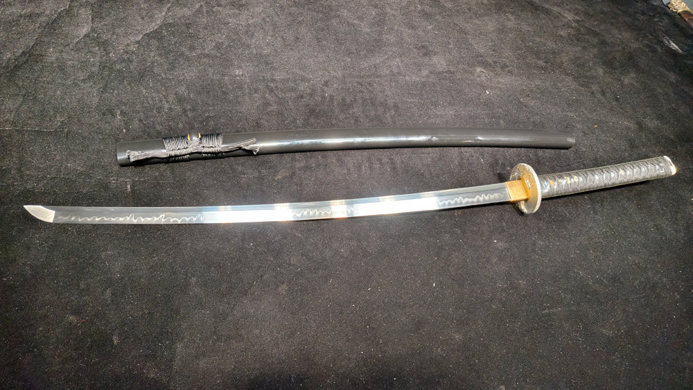 TI0 (covered with soil and burned to create the blade's ripple pattern)katana