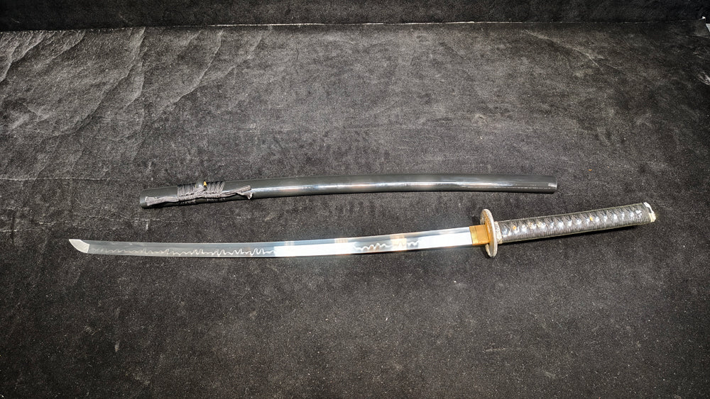 TI0 (covered with soil and burned to create the blade's ripple pattern)katana