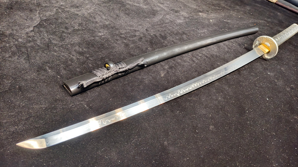 TI0 (covered with soil and burned to create the blade's ripple pattern)katana