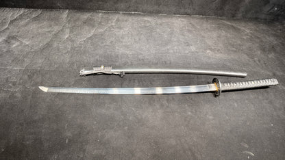 TI0 (covered with soil and burned to create the blade's ripple pattern)katana