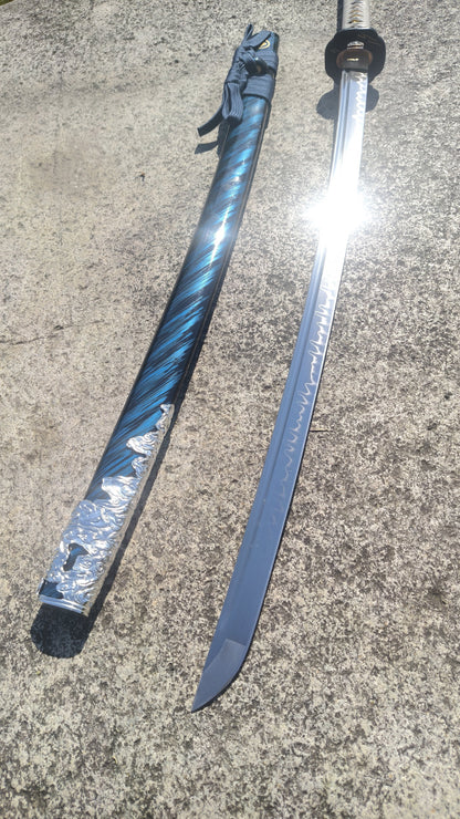 Ghost of Tsushima Long Katana, Full Tang Construction, Hand Forged T10 Steel Clay Tempered Blade, Sharp Edge, Hand Polished For Enhanced Sharpness, Alloy Fittings, Solid Wood Scabbard With Real Ray Skin Handle, Collectible Replica Samurai Sword