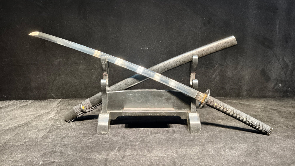 TI0 (covered with soil and burned to create the blade's ripple pattern)katana