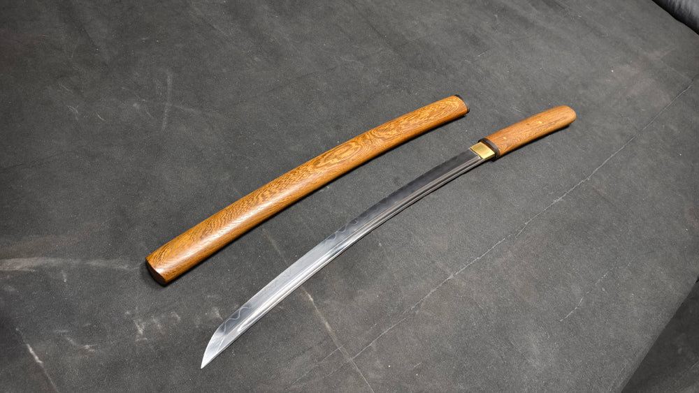 TI0 (covered with soil and burned to create the blade's ripple pattern)katana