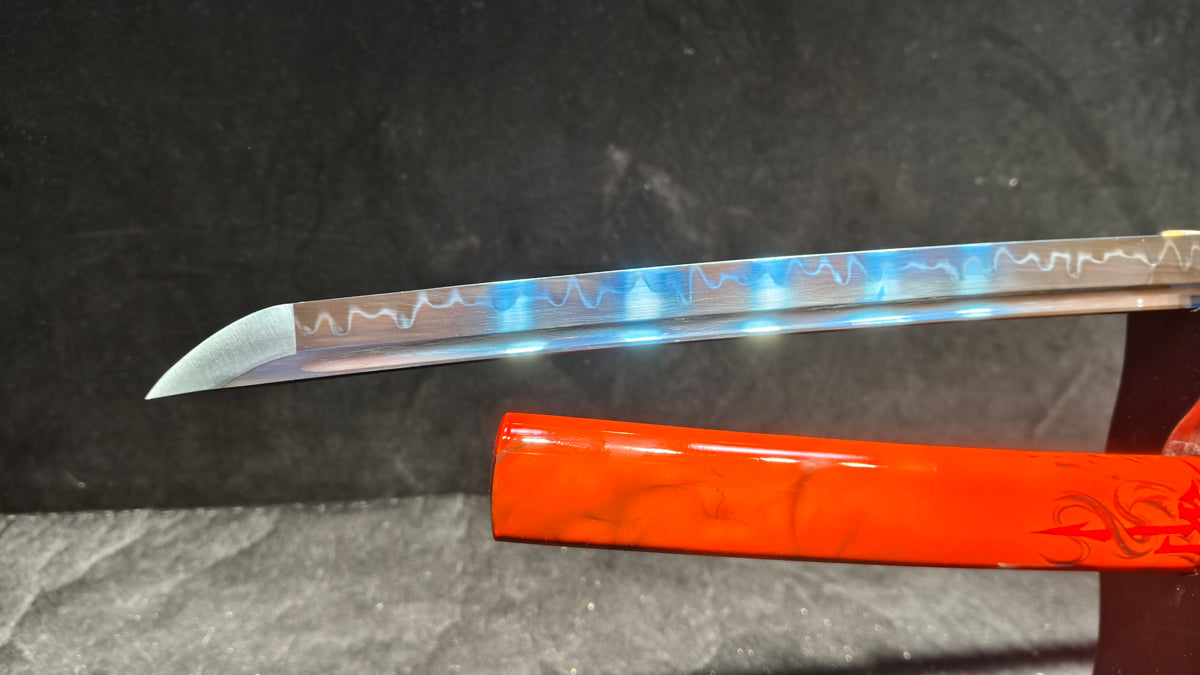 TI0 (covered with soil and burned to create the blade's ripple pattern)katana