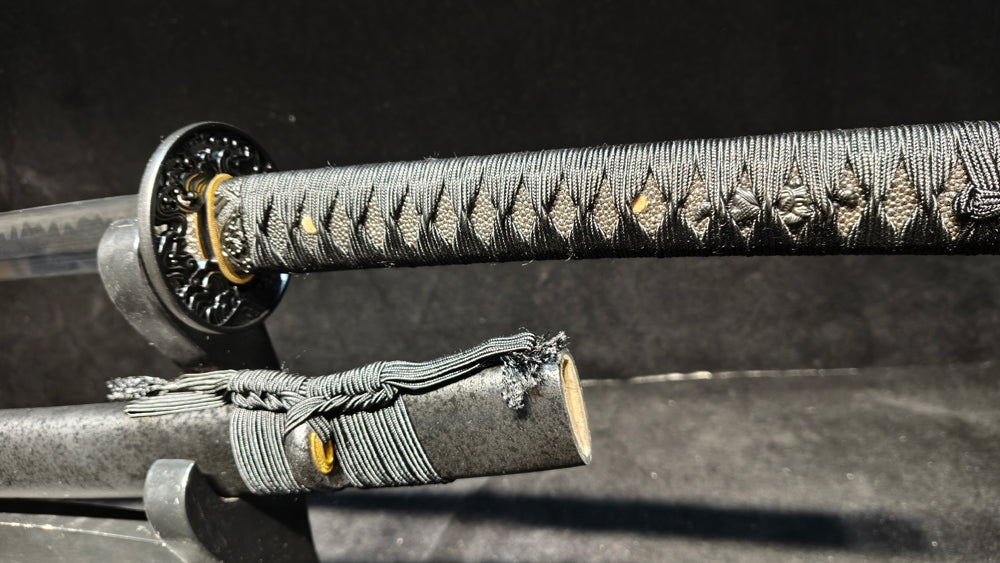 TI0 (covered with soil and burned to create the blade's ripple pattern)katana