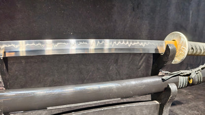 TI0 (covered with soil and burned to create the blade's ripple pattern)katana