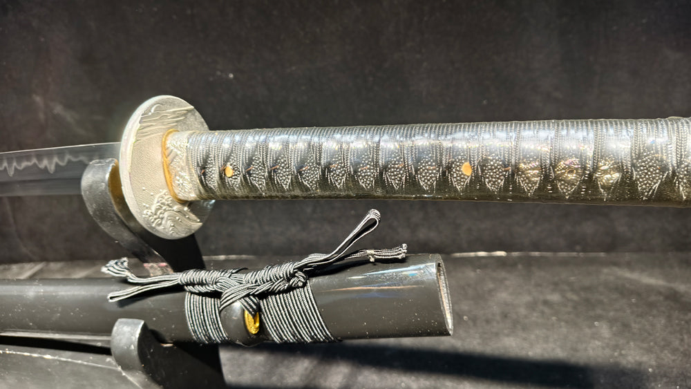 TI0 (covered with soil and burned to create the blade's ripple pattern)katana