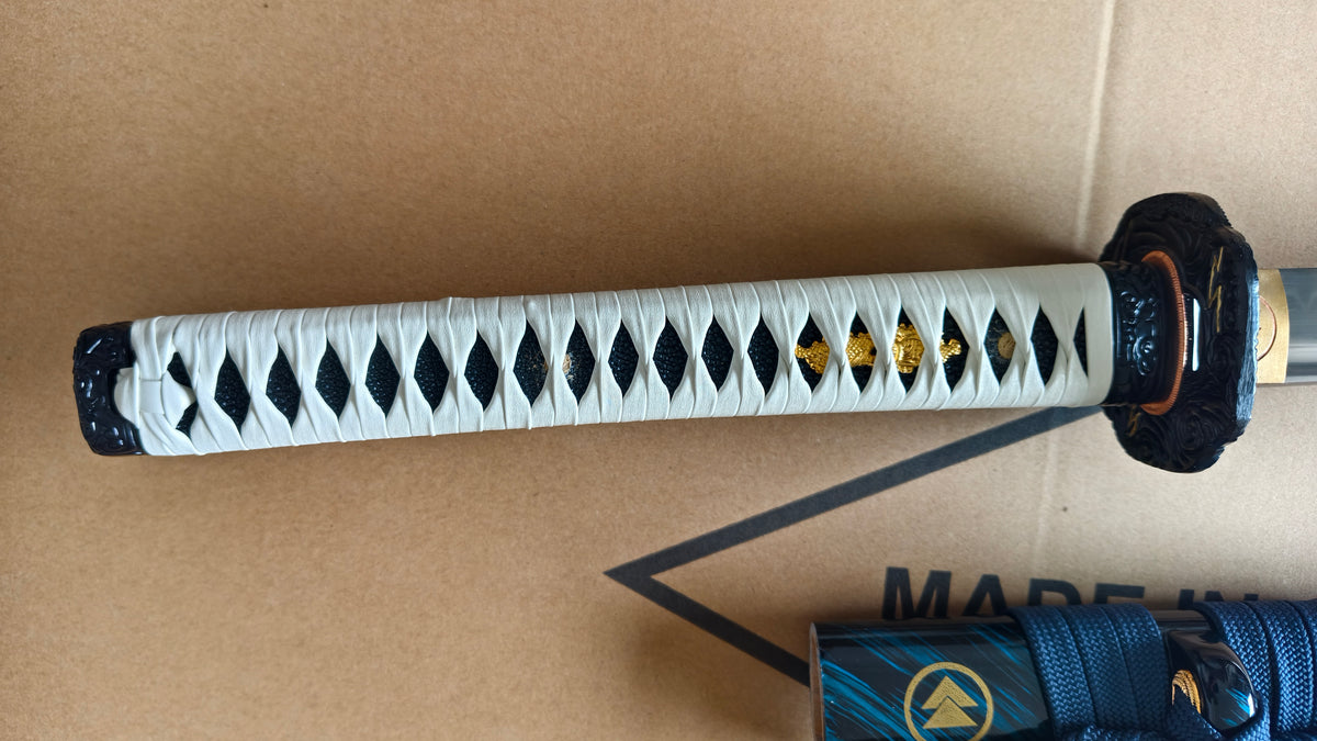 Ghost of Tsushima Long Katana, Full Tang Construction, Hand Forged T10 Steel Clay Tempered Blade, Sharp Edge, Hand Polished For Enhanced Sharpness, Alloy Fittings, Solid Wood Scabbard With Real Ray Skin Handle, Collectible Replica Samurai Sword
